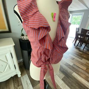 Top Alice +Olivia size Lg orange and light purple is good condition